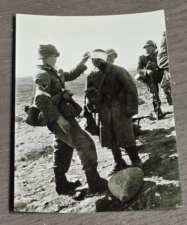 20260527_175925 WWII German Medic Treating Soviet POW Eastern Front 1941 Photo