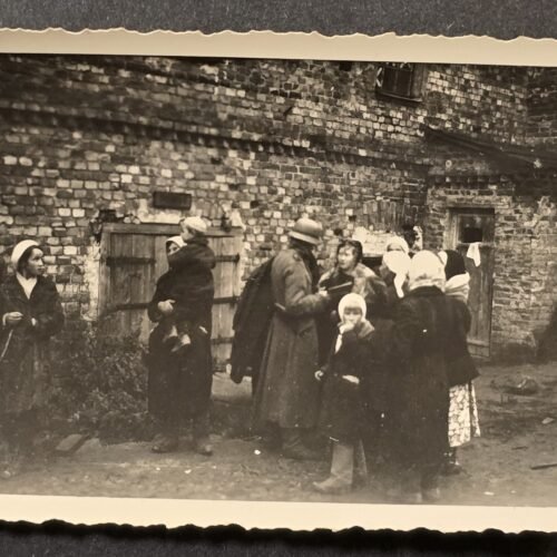 20260801_163230 PAPERS PLEASE! Rare Original WWII German Jewish Ghetto Photograph – Wehrmacht Soldier Checking Civilians' Papers – Occupied Eastern Europe