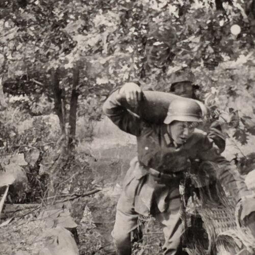COMBAT FIELD SHOT Wehrmacht soldier carries Mortar Shell Military WW2 German War Photo