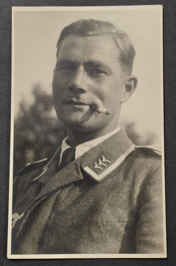 20260826_171320 WW2 Nazi German Smoking Luftwaffe Soldier w Cigarette Holder RPPC Photo Postcard