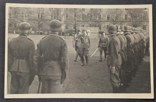 20260826_173521 WWII German Decorated Wehrmacht Officers Parade Inspection Photo Postcard Swastika Banner Sword